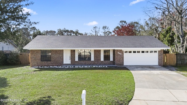 single story home featuring fence, concrete driveway, a front yard, and a garage