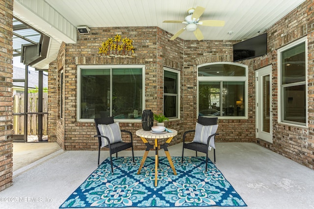 view of patio with ceiling fan