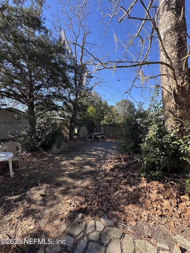 view of yard with fence