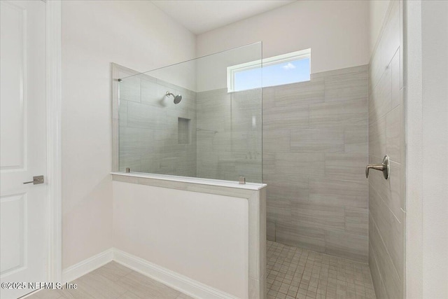 bathroom featuring a walk in shower