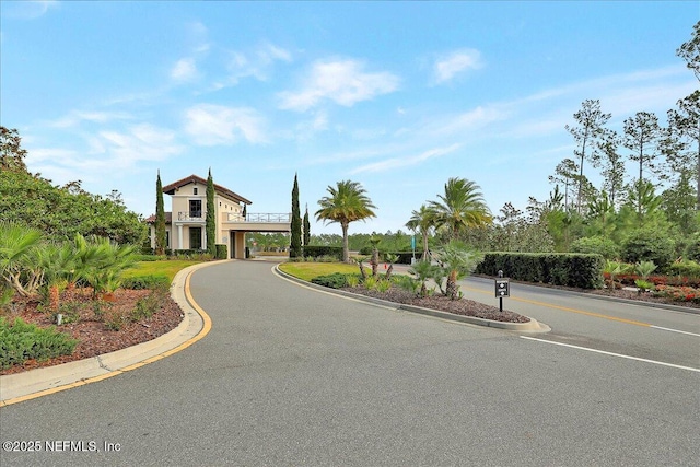 view of road featuring curbs