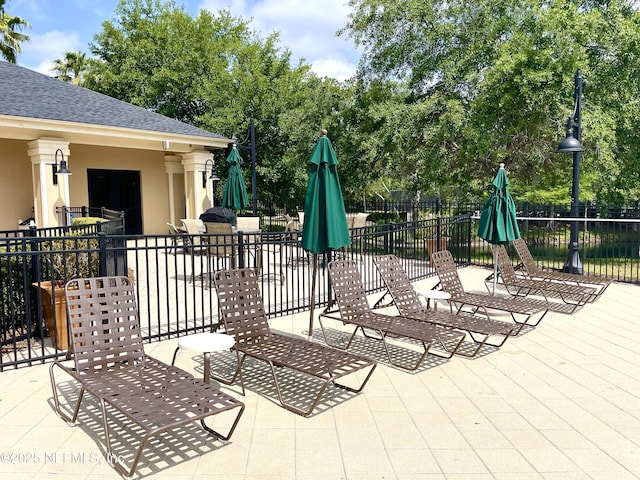 view of patio / terrace with fence