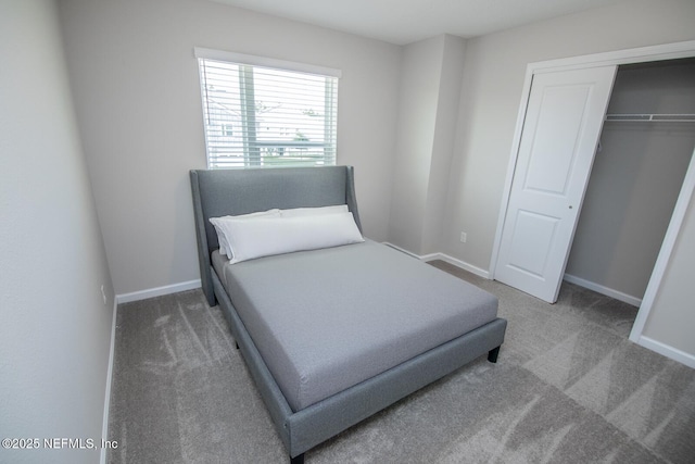 11213 Minnetta Ct, Jacksonville, FL 32256 - carpeted bedroom with baseboards and a closet
