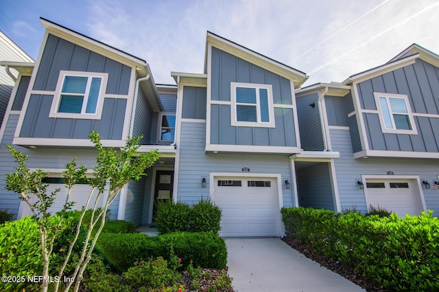 11213 Minnetta Ct, Jacksonville, FL 32256 - multi unit property with concrete driveway, board and batten siding, and an attached garage