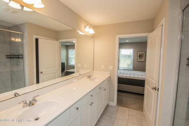 11213 Minnetta Ct, Jacksonville, FL 32256 - ensuite bathroom with a sink, a shower stall, tile patterned floors, and ensuite bath