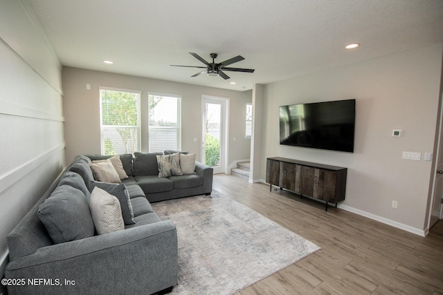 11213 Minnetta Ct, Jacksonville, FL 32256 - living area featuring recessed lighting, ceiling fan, wood finished floors, and baseboards