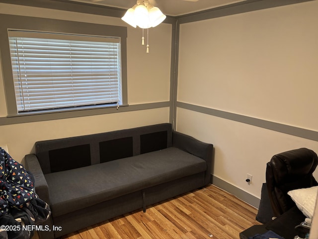 office space featuring wood finished floors and baseboards