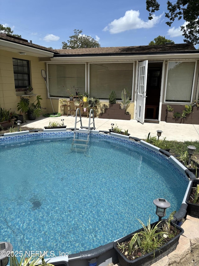 6050 Carrevero Dr S, Jacksonville, FL 32216 - swimming pool with a patio