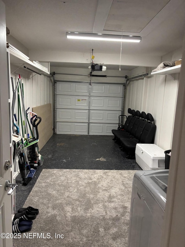 6050 Carrevero Dr S, Jacksonville, FL 32216 - garage featuring washer and clothes dryer and a garage door opener