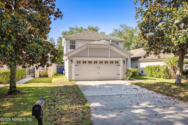 1821 Enterprise Ave, Saint Augustine, FL 32092 - traditional-style home with a garage, concrete driveway, stucco siding, a gate, and a shingled roof