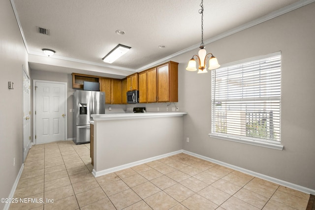 1821 Enterprise Ave, Saint Augustine, FL 32092 - kitchen featuring appliances with stainless steel finishes, brown cabinets, light tile patterned floors, crown molding, and a chandelier