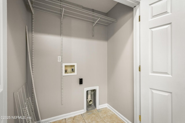 1821 Enterprise Ave, Saint Augustine, FL 32092 - laundry area featuring washer hookup, baseboards, and light tile patterned floors