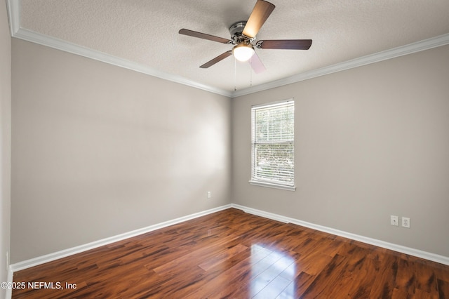 1821 Enterprise Ave, Saint Augustine, FL 32092 - spare room featuring dark wood-style floors, baseboards, a textured ceiling, ceiling fan, and crown molding
