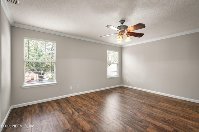 1821 Enterprise Ave, Saint Augustine, FL 32092 - empty room with dark wood-type flooring, plenty of natural light, a textured ceiling, baseboards, and crown molding
