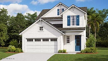 view of front of home featuring a garage, a front lawn, and concrete driveway