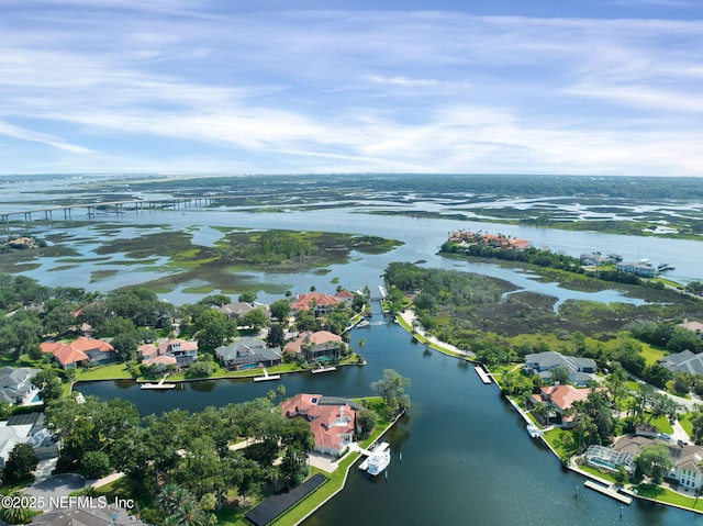 aerial view with a residential view and a water view