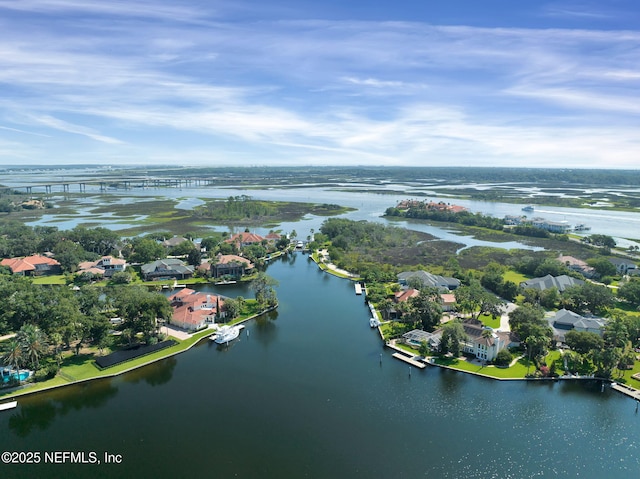 aerial view featuring a residential view and a water view