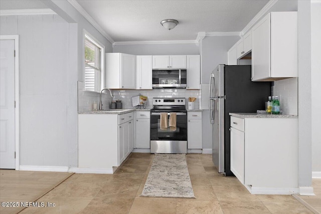 1232 Hamilton St, Jacksonville, FL 32205 - kitchen featuring tasteful backsplash, appliances with stainless steel finishes, white cabinets, ornamental molding, and a sink