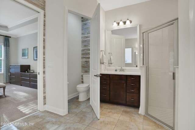 full bathroom featuring toilet, a stall shower, tile patterned floors, and vanity