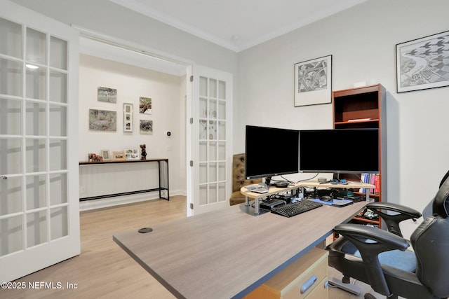 home office featuring wood finished floors, french doors, and crown molding