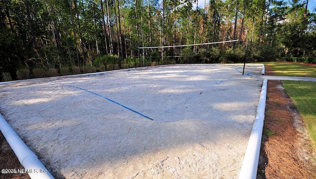 view of home's community featuring volleyball court