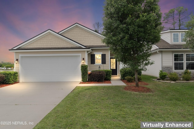 view of front facade featuring driveway, a garage, and a front yard
