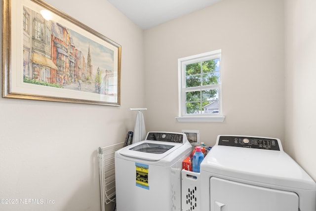 laundry area featuring laundry area and washer and dryer