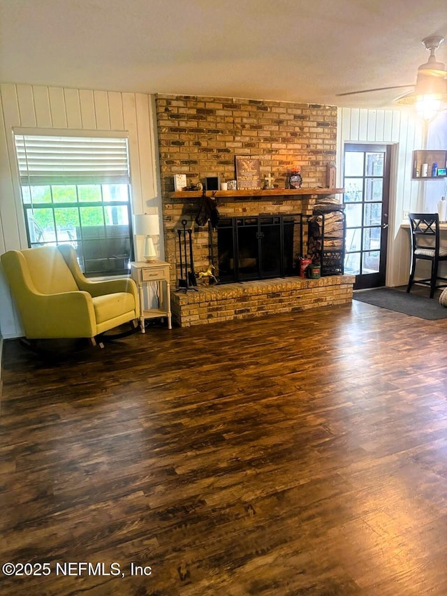 114 Timber Ln, Palatka, FL 32177 - living room with wood finished floors and a brick fireplace