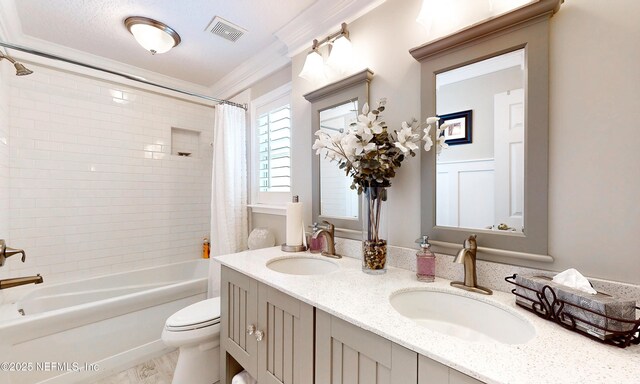 4637 Saddlehorn Trl, Middleburg, FL 32068 - bathroom with shower / bath combo, toilet, ornamental molding, and double vanity