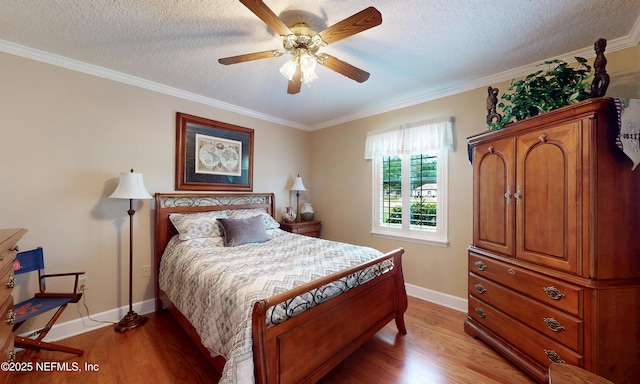 4637 Saddlehorn Trl, Middleburg, FL 32068 - bedroom featuring light wood-style floors, baseboards, ornamental molding, a textured ceiling, and ceiling fan