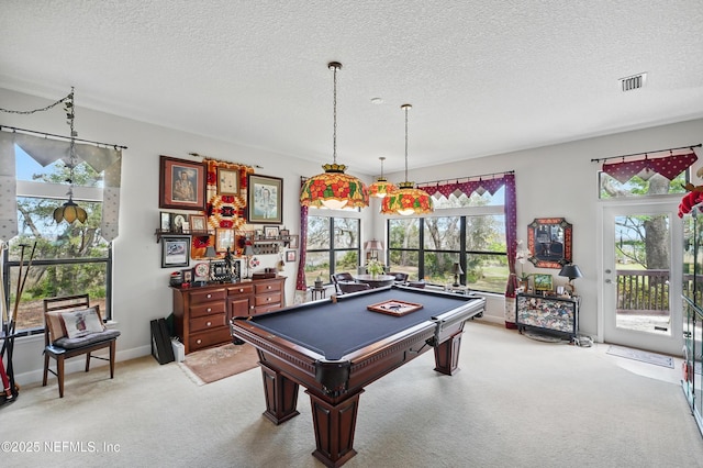 rec room with light colored carpet, billiards, baseboards, visible vents, and a textured ceiling