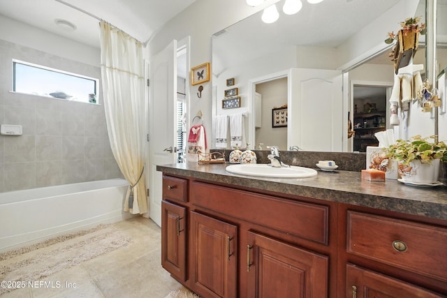 bathroom with vanity, shower / bath combination with curtain, and tile patterned flooring