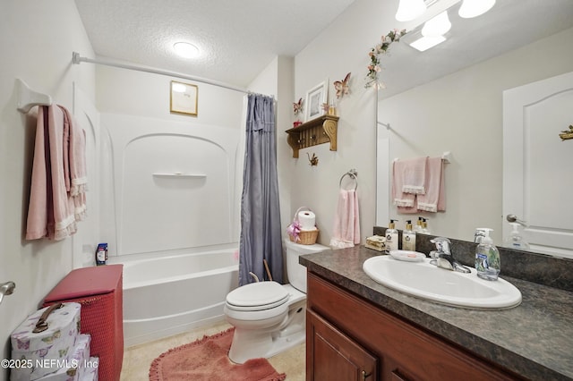 bathroom with a textured ceiling, shower / tub combo with curtain, toilet, vanity, and tile patterned flooring