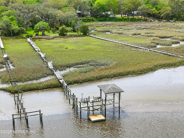 dock area featuring a water view and boat lift