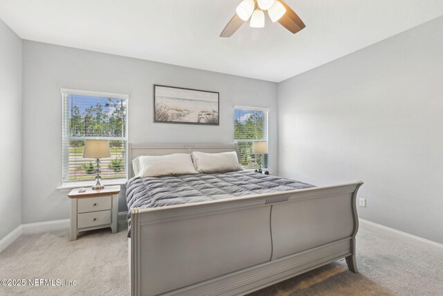 135 Neighbor Ct, Saint Augustine, FL 32092 - bedroom featuring baseboards, light carpet, and ceiling fan