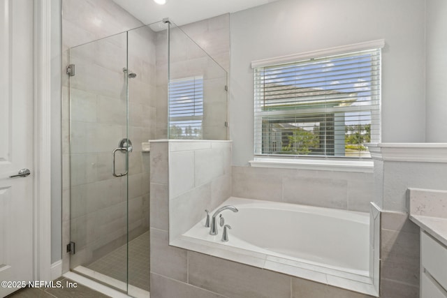 135 Neighbor Ct, Saint Augustine, FL 32092 - full bathroom featuring vanity, a stall shower, and a bath