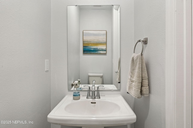 135 Neighbor Ct, Saint Augustine, FL 32092 - bathroom featuring a sink and toilet
