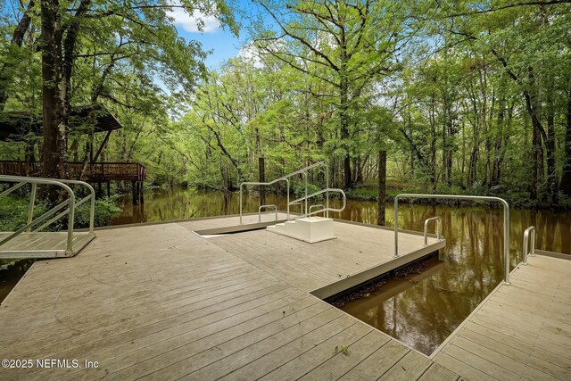 135 Neighbor Ct, Saint Augustine, FL 32092 - view of dock featuring a water view and a wooded view