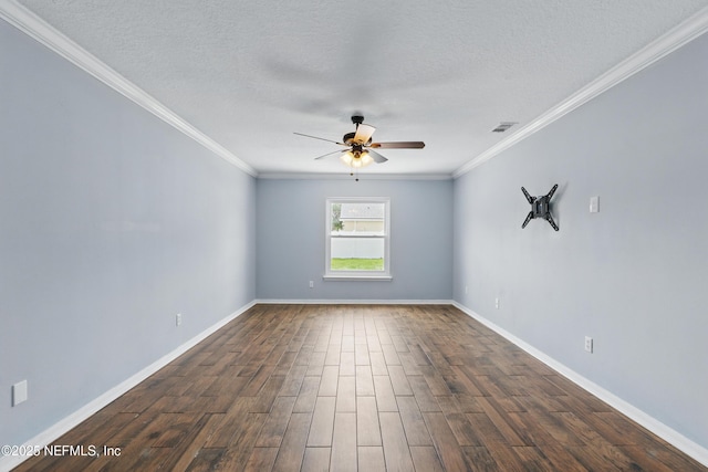 empty room with ornamental molding, ceiling fan, a textured ceiling, and dark wood-style flooring