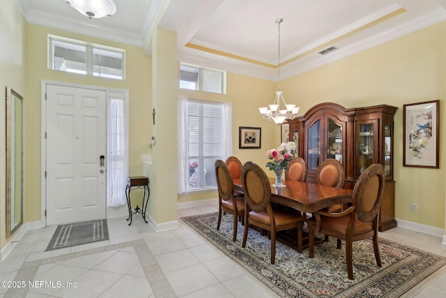 1695 Waters Edge Dr, Fleming Island, FL 32003 - dining space featuring a towering ceiling, a wealth of natural light, and a chandelier