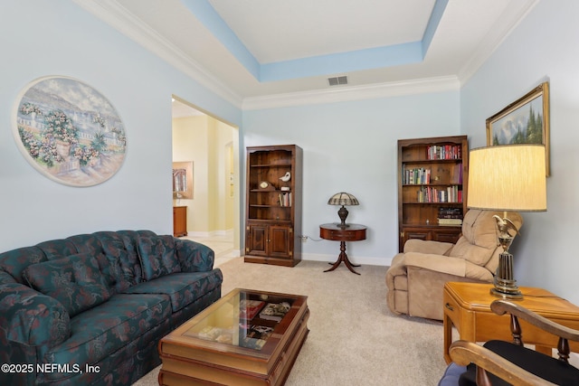 1695 Waters Edge Dr, Fleming Island, FL 32003 - living room with visible vents, ornamental molding, carpet, and a raised ceiling