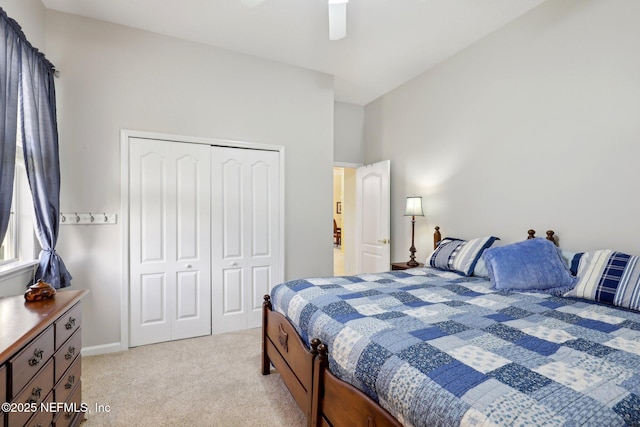 1695 Waters Edge Dr, Fleming Island, FL 32003 - bedroom with ceiling fan, light colored carpet, and a closet