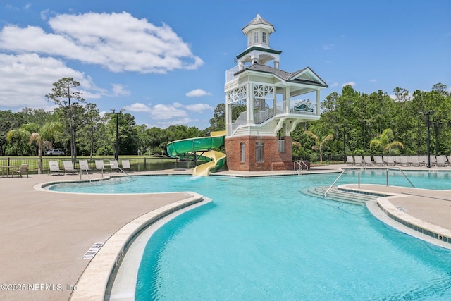 1695 Waters Edge Dr, Fleming Island, FL 32003 - pool featuring fence, a water slide, and a patio area