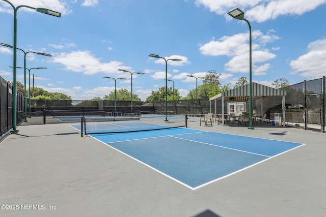 1695 Waters Edge Dr, Fleming Island, FL 32003 - view of tennis court featuring fence