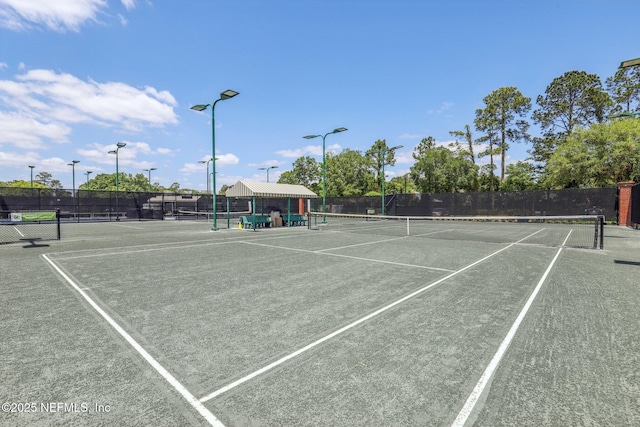 1695 Waters Edge Dr, Fleming Island, FL 32003 - view of tennis court featuring fence