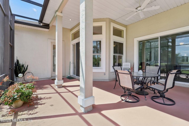 1695 Waters Edge Dr, Fleming Island, FL 32003 - view of patio / terrace with outdoor dining area and ceiling fan