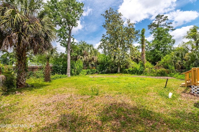 view of yard featuring fence