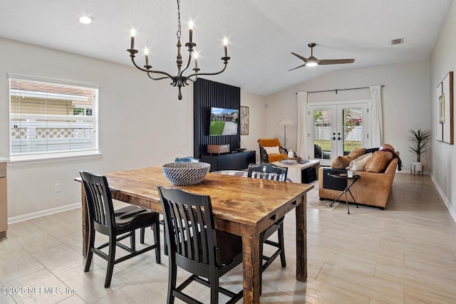 dining room with french doors, baseboards, ceiling fan with notable chandelier, and visible vents