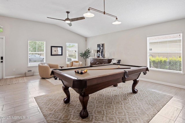 recreation room with ceiling fan, pool table, wood finished floors, baseboards, and lofted ceiling