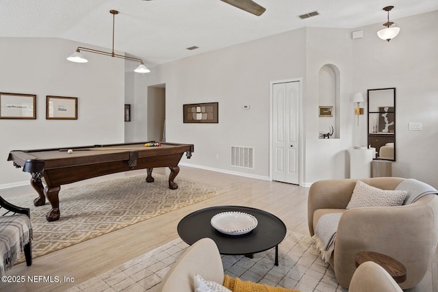 game room featuring visible vents, billiards, lofted ceiling, and light wood-type flooring